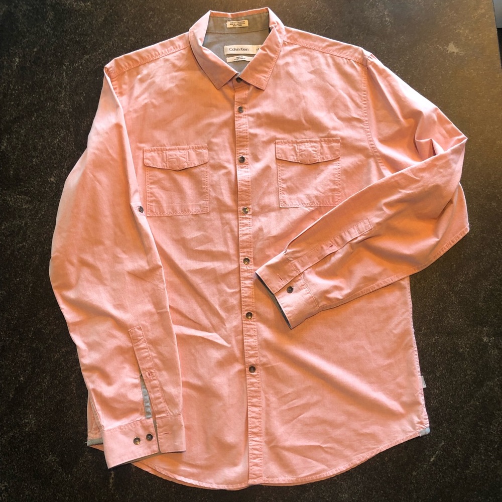 Calvin Klein. Size Large. Light red long sleeve casual dress shirt.